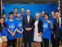 Coalition leader Peter Dutton and a group of liberal supporters at a rally.