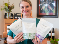 Kylie-Lee Bradford with Kakadu Organics products