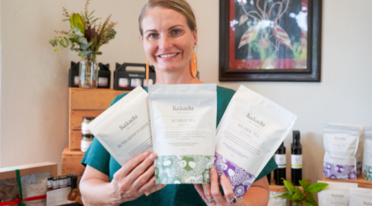 Kylie-Lee Bradford with Kakadu Organics products