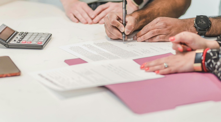 Person signing a form