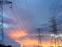 Electricity towers at sunset